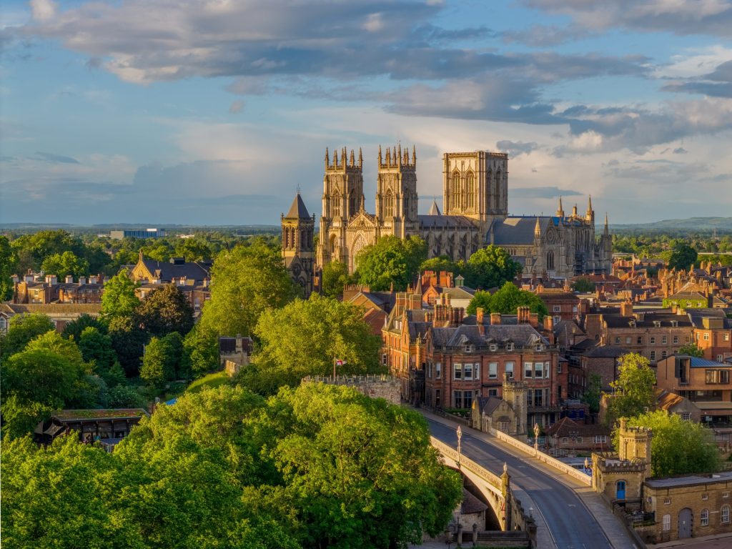 Knights becomes top law firm in York and expands East of England presence - A view of a city with a castle in the background.