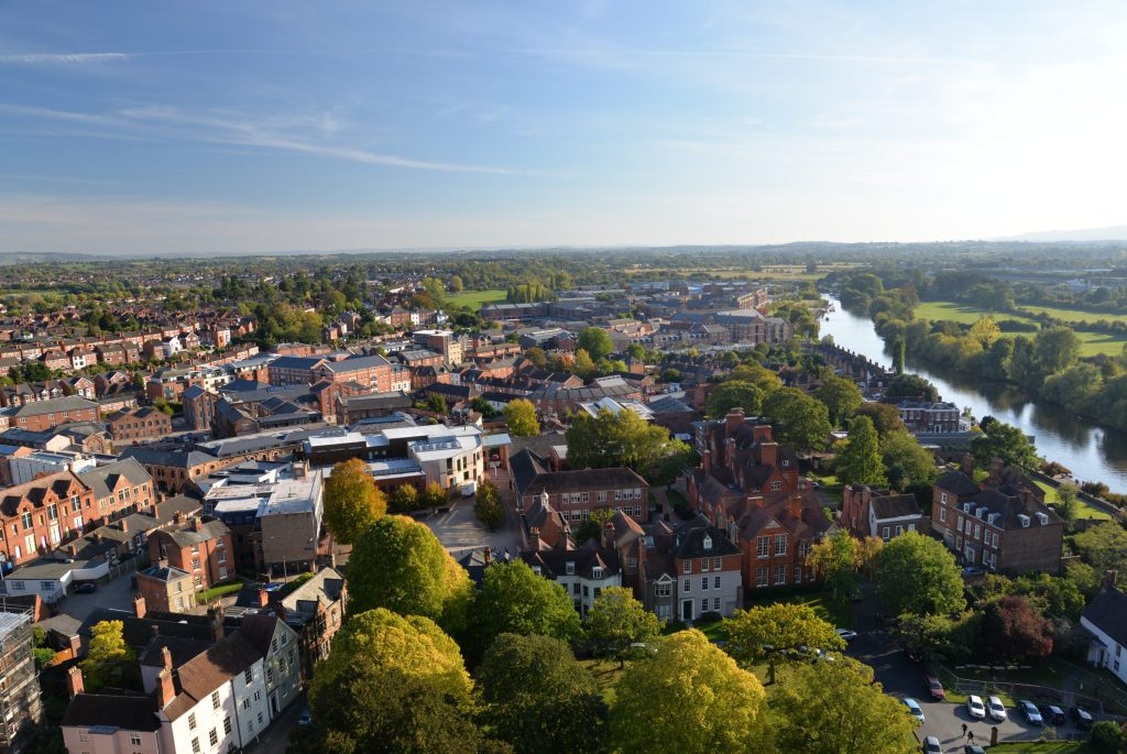 Knights significantly strengthens West Midlands presence with Thursfields acquisition - A view of a city with a river running through it.
