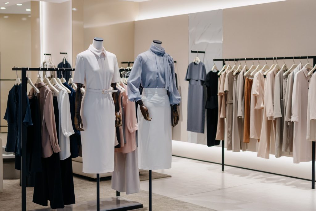 Agon Systems' transition to an employee ownership trust - A row of mannequins in a clothing store.
